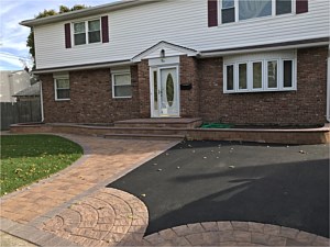 golden brown nicolock verona wall untumbled planter box curve circle fan kit walkway asphalt driveway bethpage